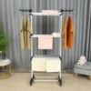 Premium Multifunctional Cloth Drying Rack • Material: Powder-coated steel frame, ABS plastic • Dimensions: Fully extended – 60 x 30 x 72 inches • Weight Capacity: Up to 15 lbs per shelf • Additional Features: Foldable shelves, hanger slots, lockable caster wheels Features and Benefits • Durable Build: Constructed with premium steel and ABS plastic, this rack resists rust and corrosion, ensuring long-lasting performance and stability. • Versatile Shelves: Six collapsible and retractable shelves offer ample drying space and easily adapt to your specific needs. Perfect for any garment type! • Space for Shoes, Too: Steel-reinforced base bars are powder-coated, providing additional space for drying or storing shoes. • Functional Hanger Slots: Top-side slots for two-wing hangers ensure optimal drying and neat clothing organization. • Easy Mobility with Lockable Wheels: Four smooth-rolling wheels allow effortless movement indoors and outdoors, with lockable casters keeping everything in place. Detailed Description Built for modern lifestyles, this cloth drying rack blends practicality with innovation. Its heavy-duty steel frame is powder-coated for excellent rust protection, making it perfect for both humid laundry rooms and outdoor use. The sturdy ABS plastic reinforcements provide an extra layer of stability, so you can trust it to support heavier loads with ease. With six shelves that can be customized for different items (from large towels to delicate garments), plus designated hanger slots for shirts or specialty drying, this rack maximizes every inch of space. The lower bar structure doubles as an ideal shoe drying area. Best of all, its portable design with lockable wheels means you can seamlessly move it wherever you need it most. Specifications • Material: Powder-coated steel frame, ABS plastic • Dimensions: Fully extended – 60 x 30 x 72 inches • Weight Capacity: Up to 15 lbs per shelf • Additional Features: Foldable shelves, hanger slots, lockable caster wheels